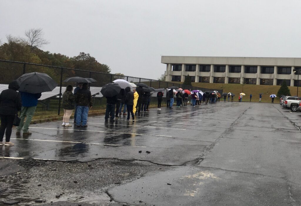 A long line in the rain, waiting to early vote in NY on Oct 29